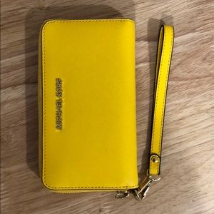 Michael Kors yellow wristlet wallet